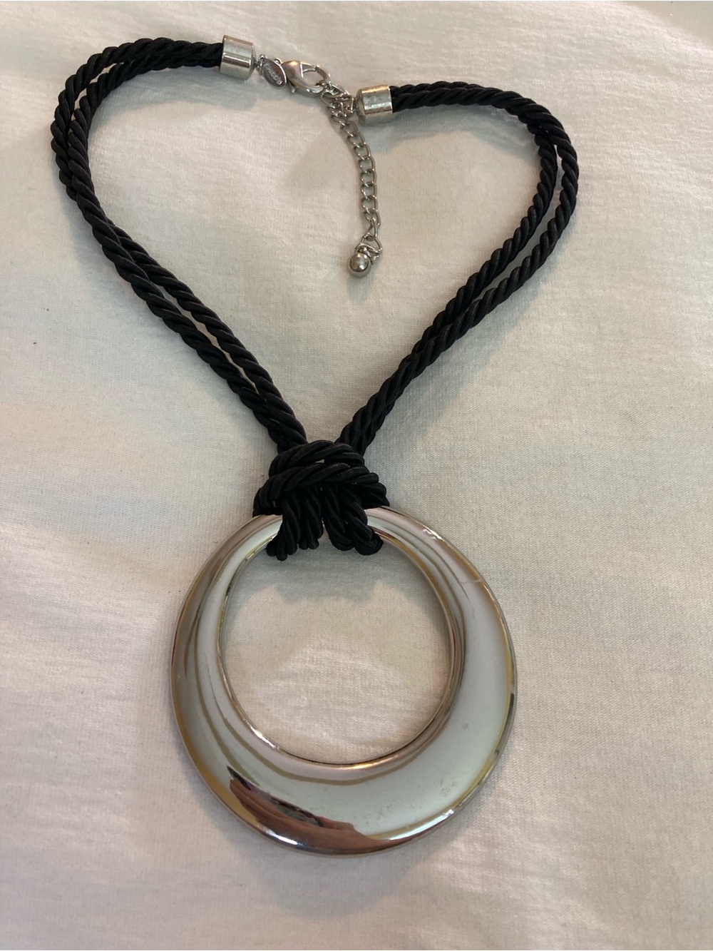 Chicoโs Large Silver Tone Pendant on Black Cord